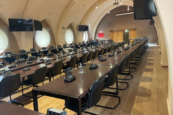 What Device Does the Digital Conferencing System Host Belong to?